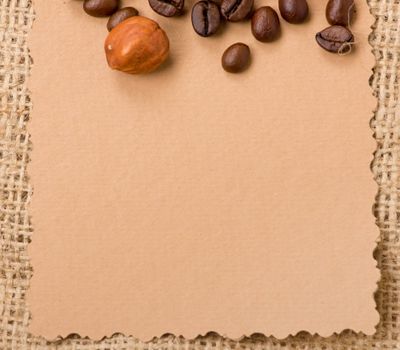 old paper for recipes and spices on burlap closeup