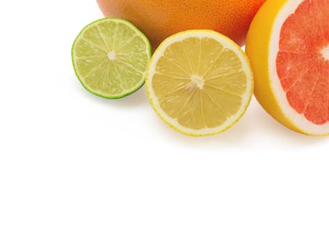 Image of a fresh whole lime, lemon and orange isolated on white