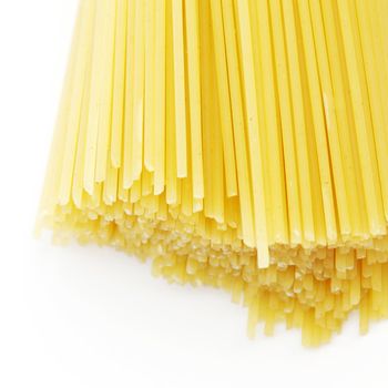 Dry spaghetti isolated on white background