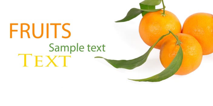 Tangerines with green leaves isolated on white