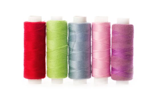 bobbins of thread isolated on white