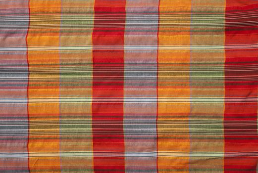 Close-up of multicoloured fabric with geometric pattern
