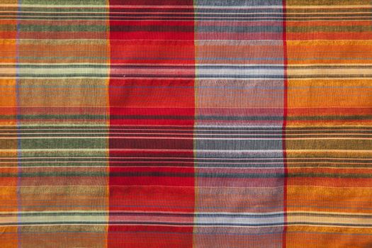 Close-up of multicoloured fabric with geometric pattern