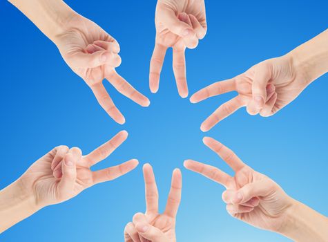 Hands of teamwork , forming the star shape