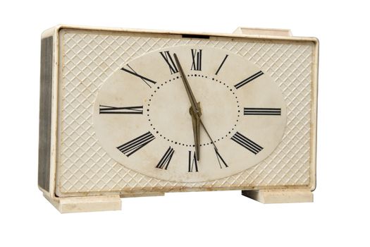 Old alarm clock isolated over white background