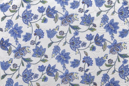 Close-up of fabric with blue flower pattern