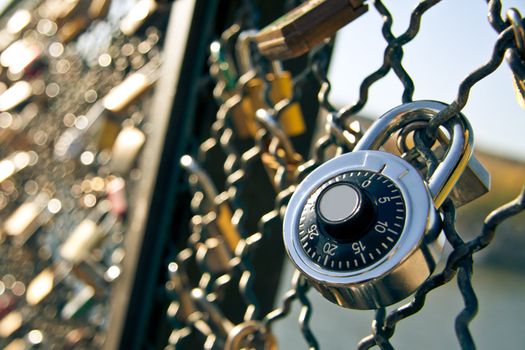 Padlock symbol of eternal love shot at Pont des Arts, Paris, France