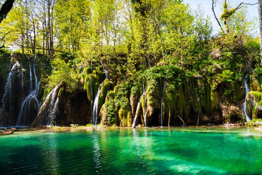 Green lake with waterfalls, shot at Plitvice lakes national park, Croatia.