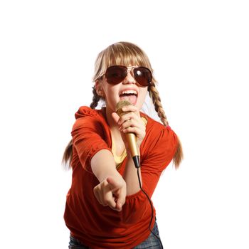 Girl singing into a microphone on a white background