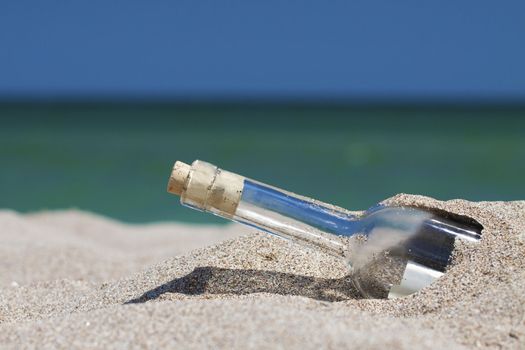 Message in a bottle with sea and the horizon