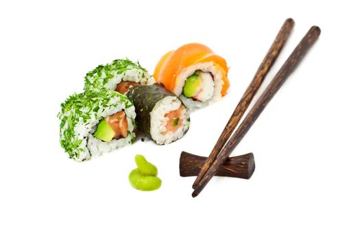 Sushi set isolated on white with chopsticks, horizontal