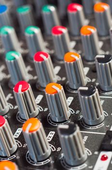 Texture of an audio mixer with buttons