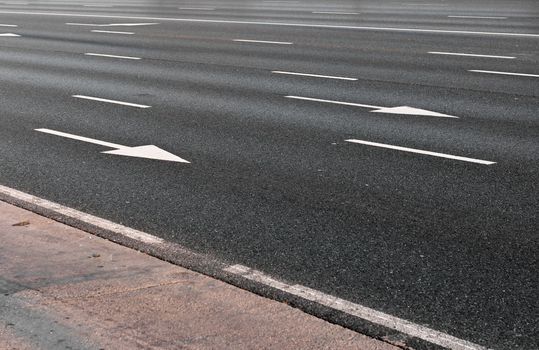 Arrow direction on asphalt