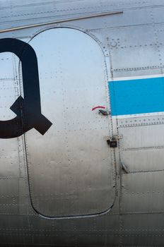 Closeup of an old airplane door