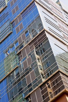 Urban architecture reflecting image of architectural design in a modern city. Generic capture of contemporary family home and office accommodation, location Bombay, India