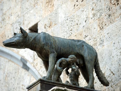 Siena - the town's emblem; a she-wolf suckling the infants Romulus and Remus.