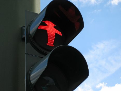 traffic light showing red, stop walking