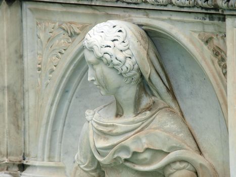 Madonna and Child . Panel of the Fonte Gaia (Fountain of Joy), Piazza del Campo, Siena.