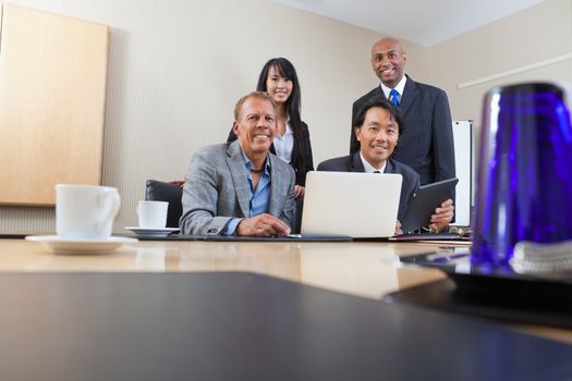 Portrait of smiling diverse colleagues in office