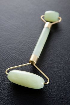 Jade roller acupuncture tool for facial massage