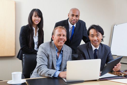 Portrait of multi ethnic businesspeople in office