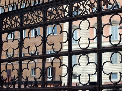 Siena - decorative grating on Piazza  del  Campo