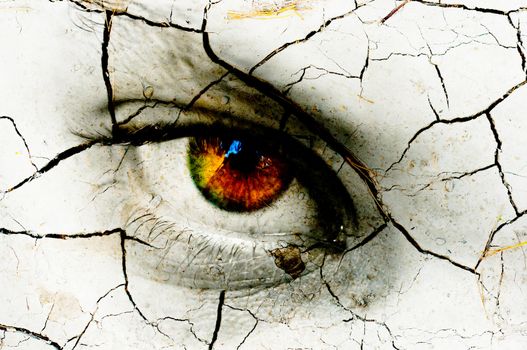 Dark art texture of a woman's eye with cracks