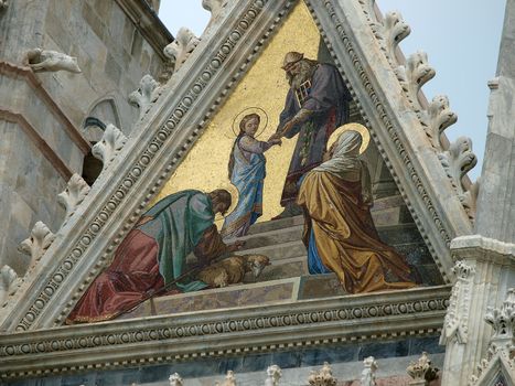 Siena - Duomo facade.The smaller mosaic,Presentation of Mary in the Temple, by Alessandro Franchi.
