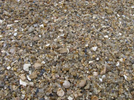 close up of stones on beach at seaside