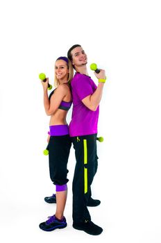 A group of young people training against white background