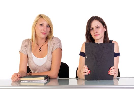 Two beautiful student girls getting ready for school isolated