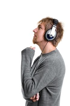 Young man with headphones against white background