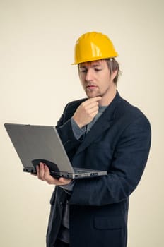 Young man in business suit against white background