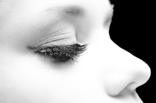 Closeup photo of a girl in the studio with white skin