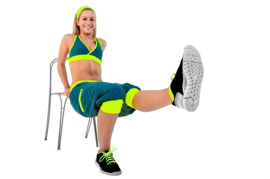 Young fitness instructor sitting on chair