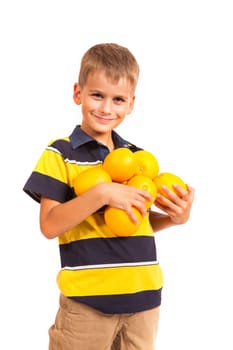 Boy holding oranges isolated on white background