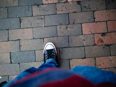 Walking on a cobblestone street