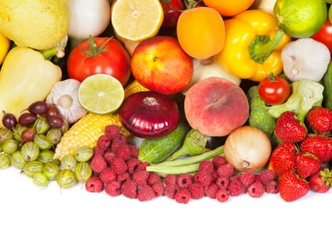 Huge group of fresh vegetables and fruits isolated on a white background. Shot in a studio