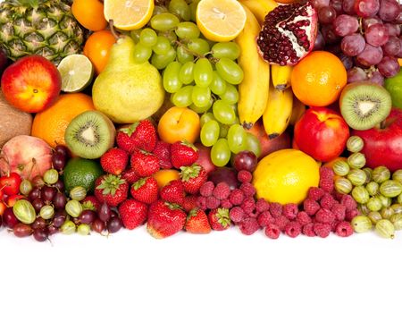 Huge group of fresh fruits isolated on a white background. Shot in a studio