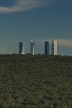 Madrid city skyline with forest in front of. Urban vs Nature