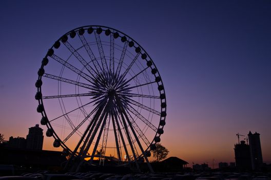 The ferris wheel in twilight.