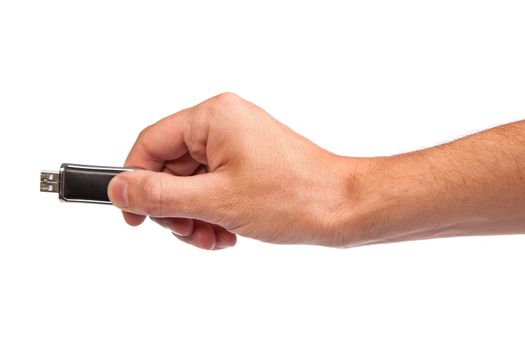 Closeup image: hand holding black USB data storage or connecting computer device with USB cable, isolated on white background