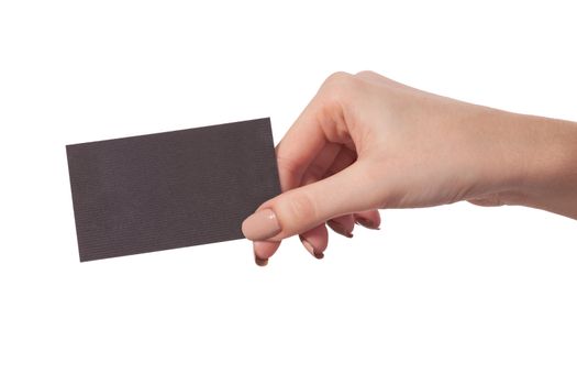 Businesswoman's hand holding blank paper business card, closeup isolated on white background
