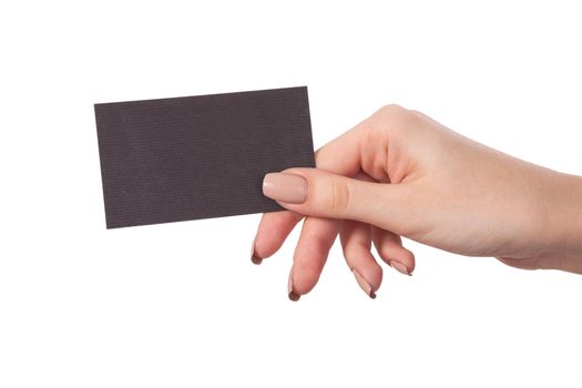 Businesswoman's hand holding blank paper business card, closeup isolated on white background