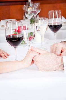 happy smiling couple in restaurant celebrate toast champagne dinner