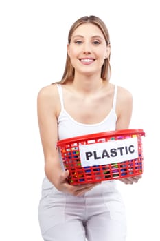 Happy young woman holding red basket in hand.