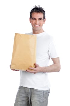 Young happy man holding shopping paper bag.