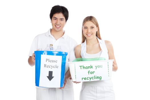 Portrait of young happy couple holding recycle bin .