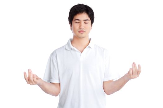 Young asian man meditating isolated on white background.