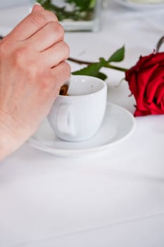 waiter serve fresh espresso for happy couple in restaurant